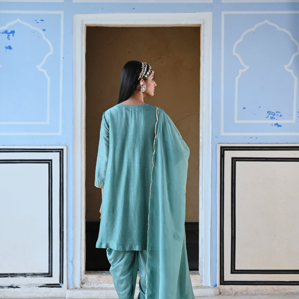 
                      
                        TURQUOISE BLUE 3/4 TH SLEEVE EMBROIDERED SHORT KURTA WITH DHOTI AND DUPATTA
                      
                    