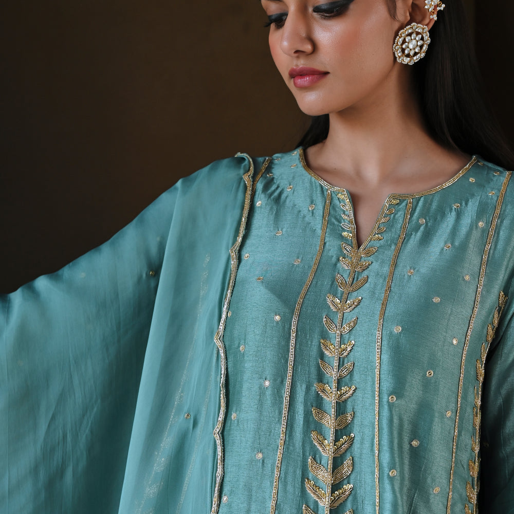 
                      
                        TURQUOISE BLUE 3/4 TH SLEEVE EMBROIDERED SHORT KURTA WITH DHOTI AND DUPATTA
                      
                    