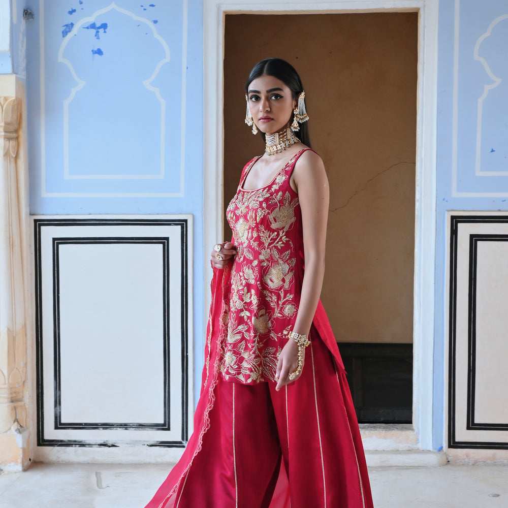 
                      
                        RED SQUARE NEKLINE BIG FLOWER JAAL EMBROIDERED SHORT KURTA WITH PALAZZO AND DUPATTA
                      
                    