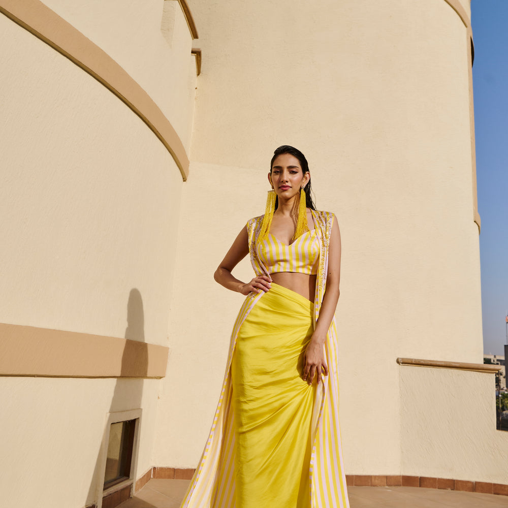 YELLOW STRIPED JACKET WITH DRAPED SKIRT AND BRALETTE