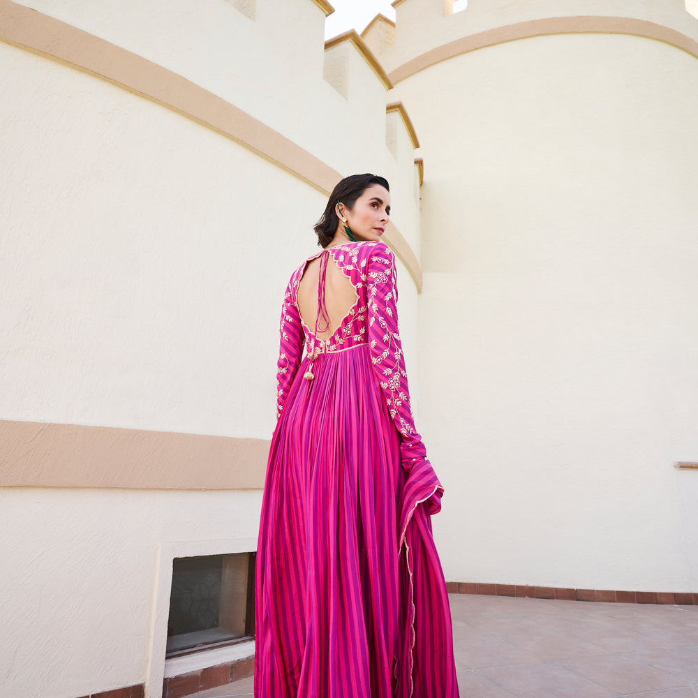 
                      
                        Fuschia Stripped Jaal Embroidered Anarkali
                      
                    