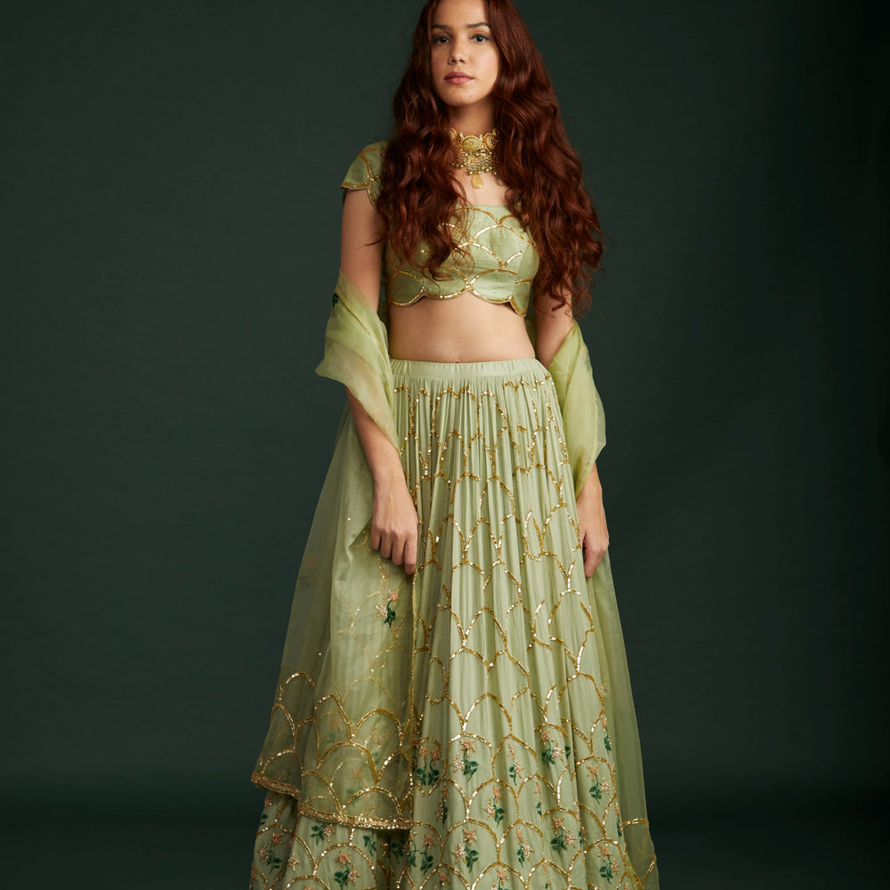 
                      
                        Mouni Roy in Scallop Lehenga
                      
                    