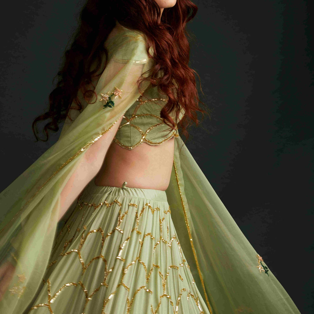 
                      
                        Mouni Roy in Scallop Lehenga
                      
                    