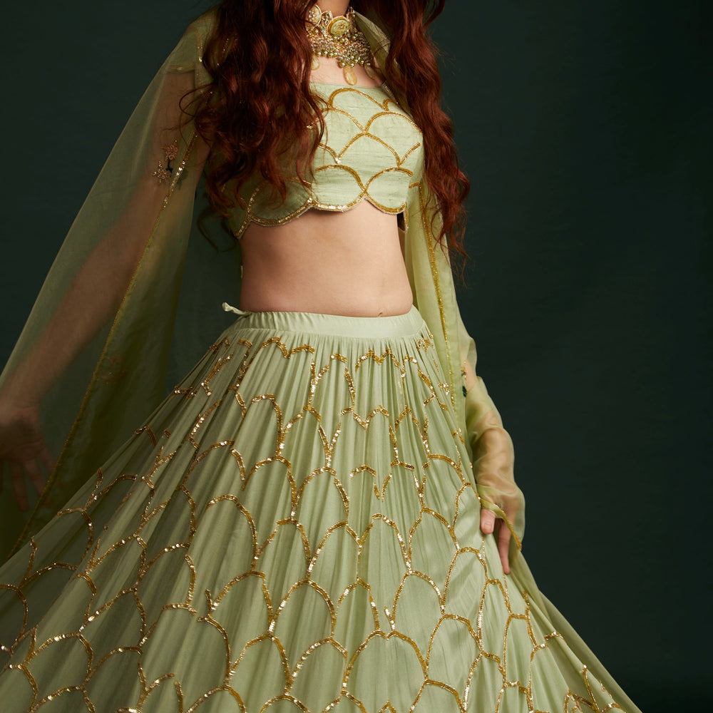 
                      
                        Mouni Roy in Scallop Lehenga
                      
                    