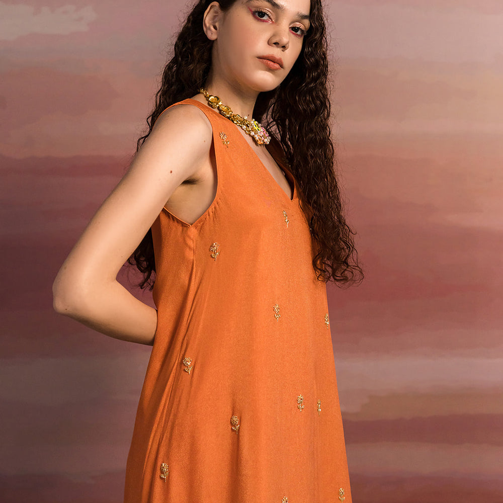 Rust Loose Kurta With Striped Pants.