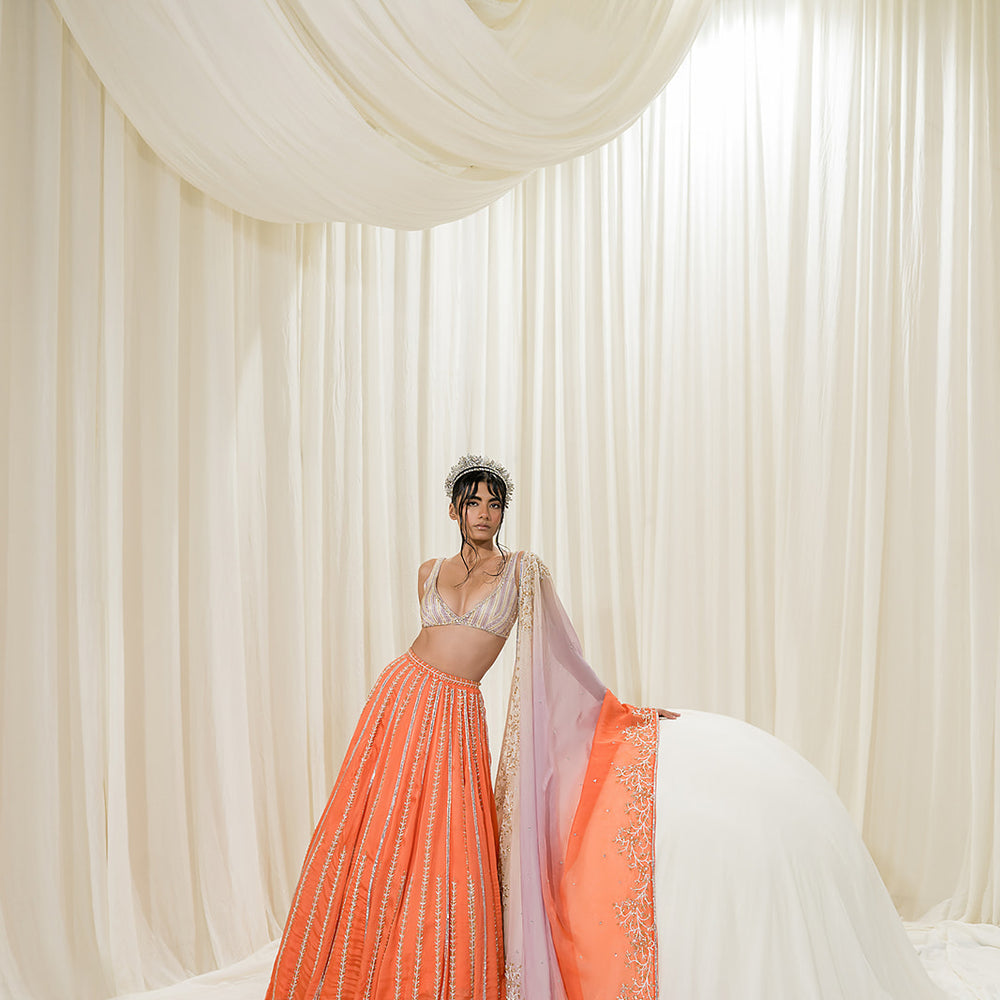 
                      
                        Orange Lehenga
                      
                    