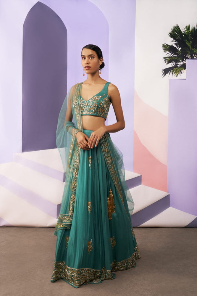
                      
                        Turquoise Lehenga
                      
                    