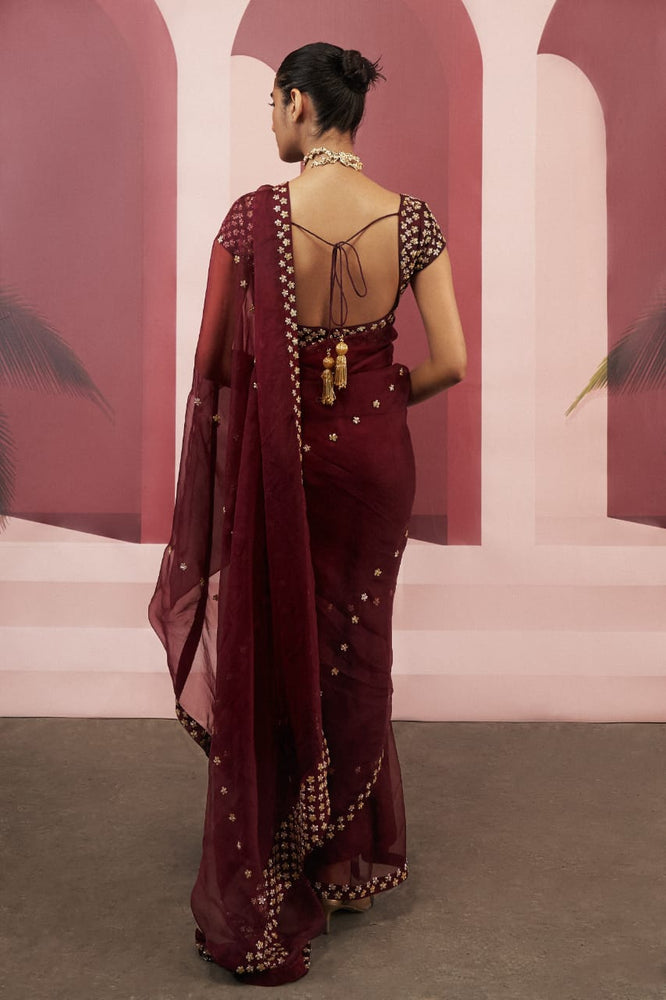 
                      
                        Burgundy Saree
                      
                    