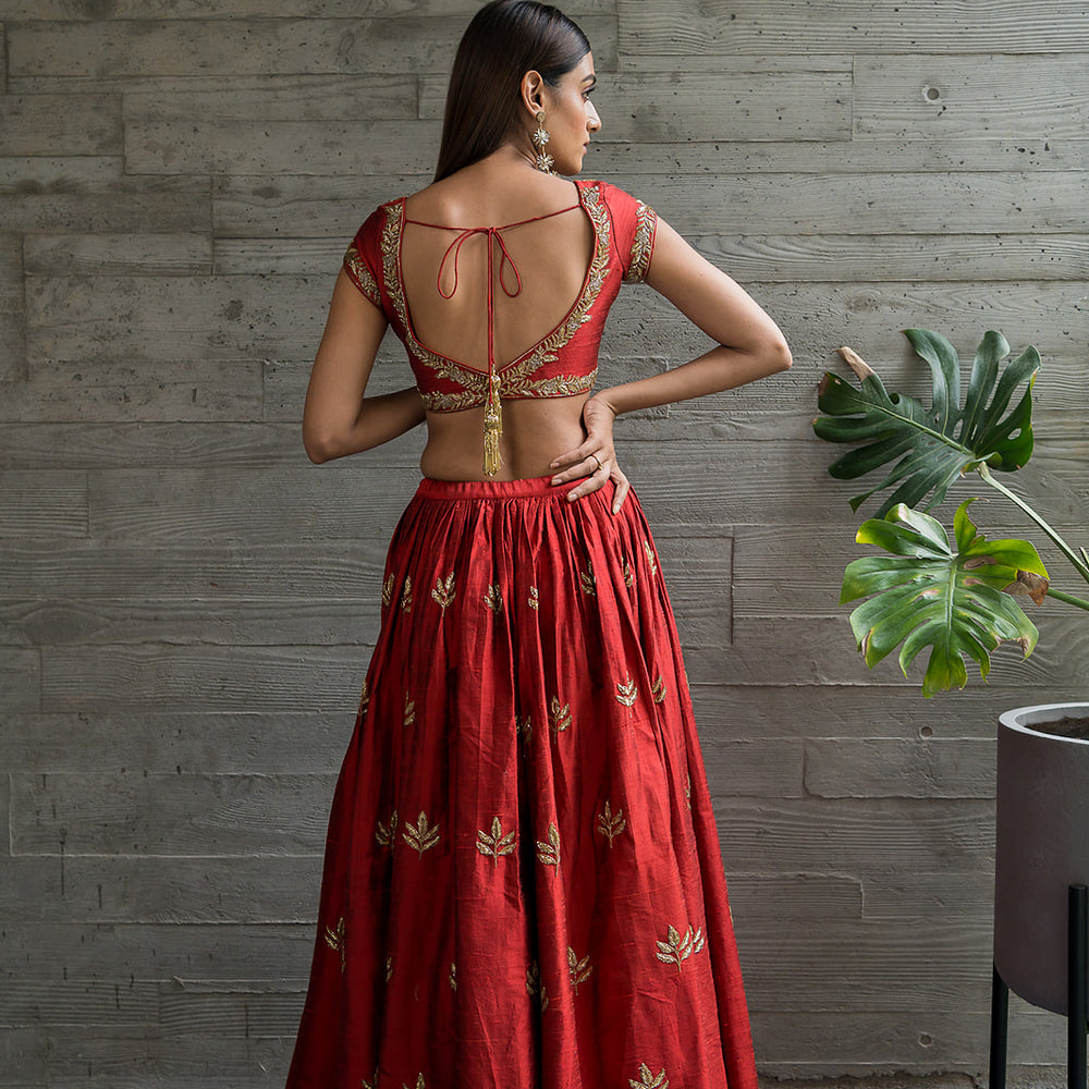 
                      
                        RED LEHENGA
                      
                    