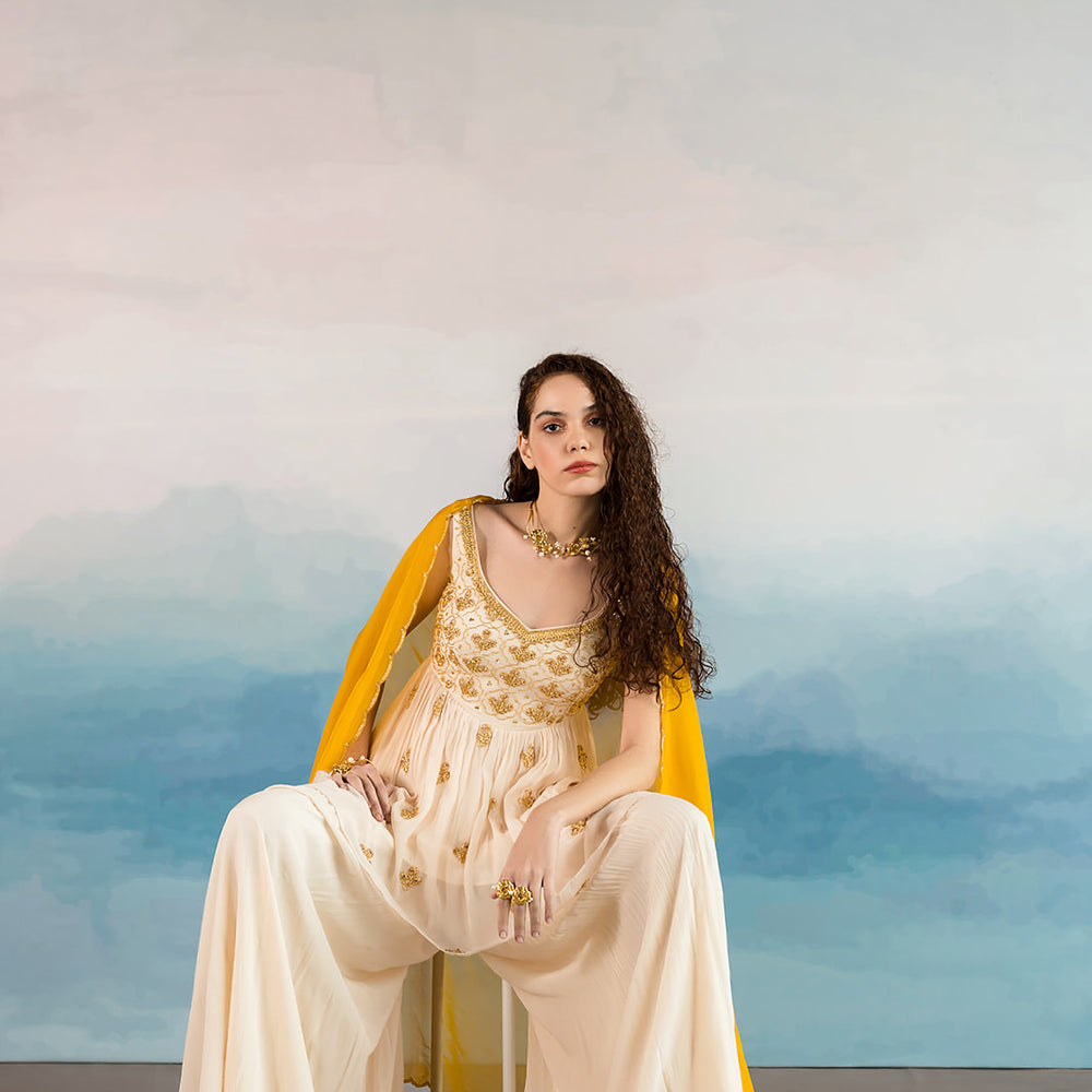 
                      
                        Off White Flower Butta Sharara Set
                      
                    