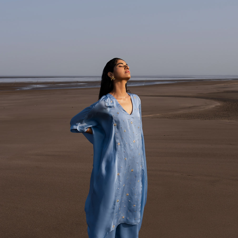 
                      
                        POWDER BLUE COWL KURTA SET
                      
                    