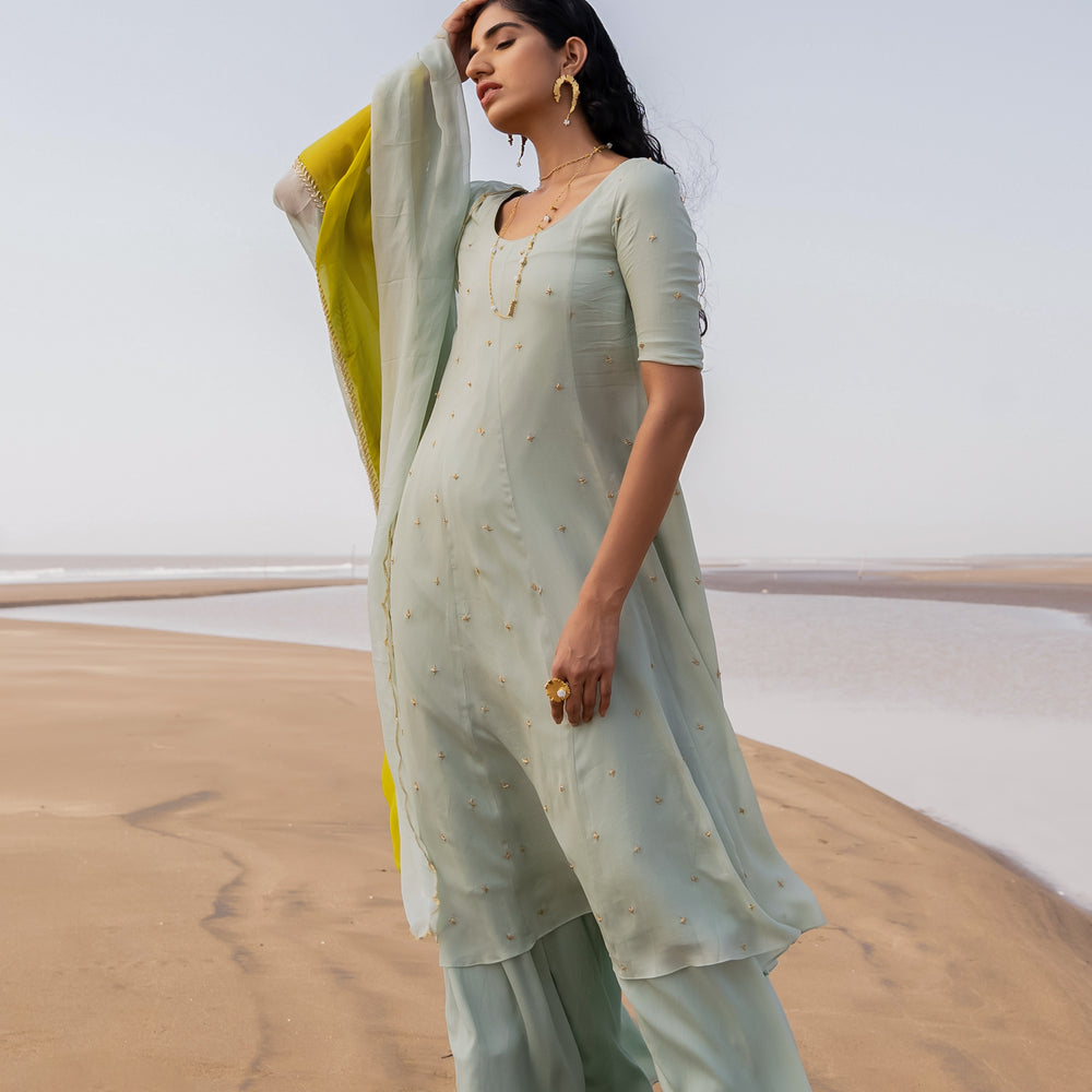 
                      
                        MINT BLUE CREPE CHITA KALIDAR KURTA WITH SHARARA AND 2 COLOR EMBROIDERED DUPATTA
                      
                    