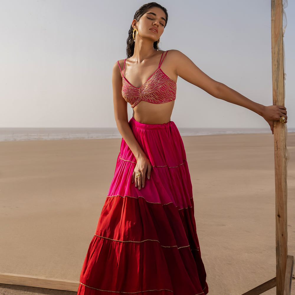 
                      
                        Saiee Manjrekar in Rani Pink-Red Tier Ghagara Set
                      
                    