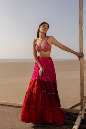 Saiee Manjrekar in Rani Pink-Red Tier Ghagara Set