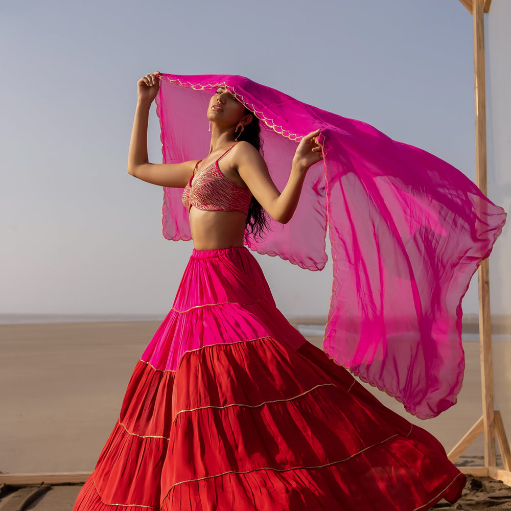 
                      
                        Saiee Manjrekar in Rani Pink-Red Tier Ghagara Set
                      
                    