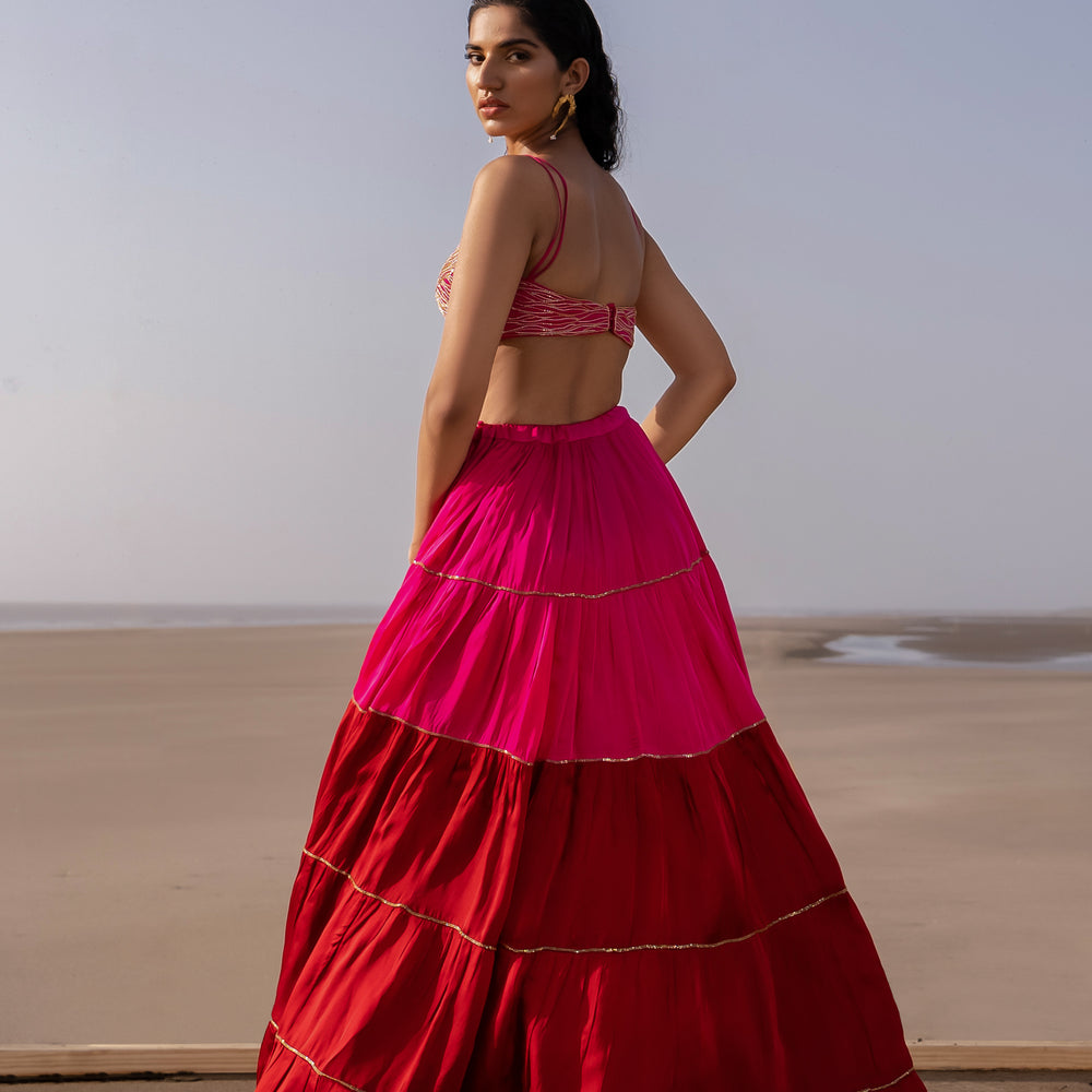 
                      
                        Saiee Manjrekar in Rani Pink-Red Tier Ghagara Set
                      
                    