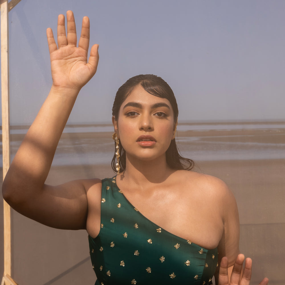 
                      
                        Bottle Green One Shoulder Jumpsuit
                      
                    